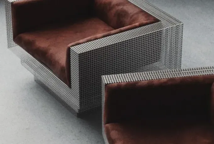Lounge chair with a perforated steel frame and brown velvet cushions